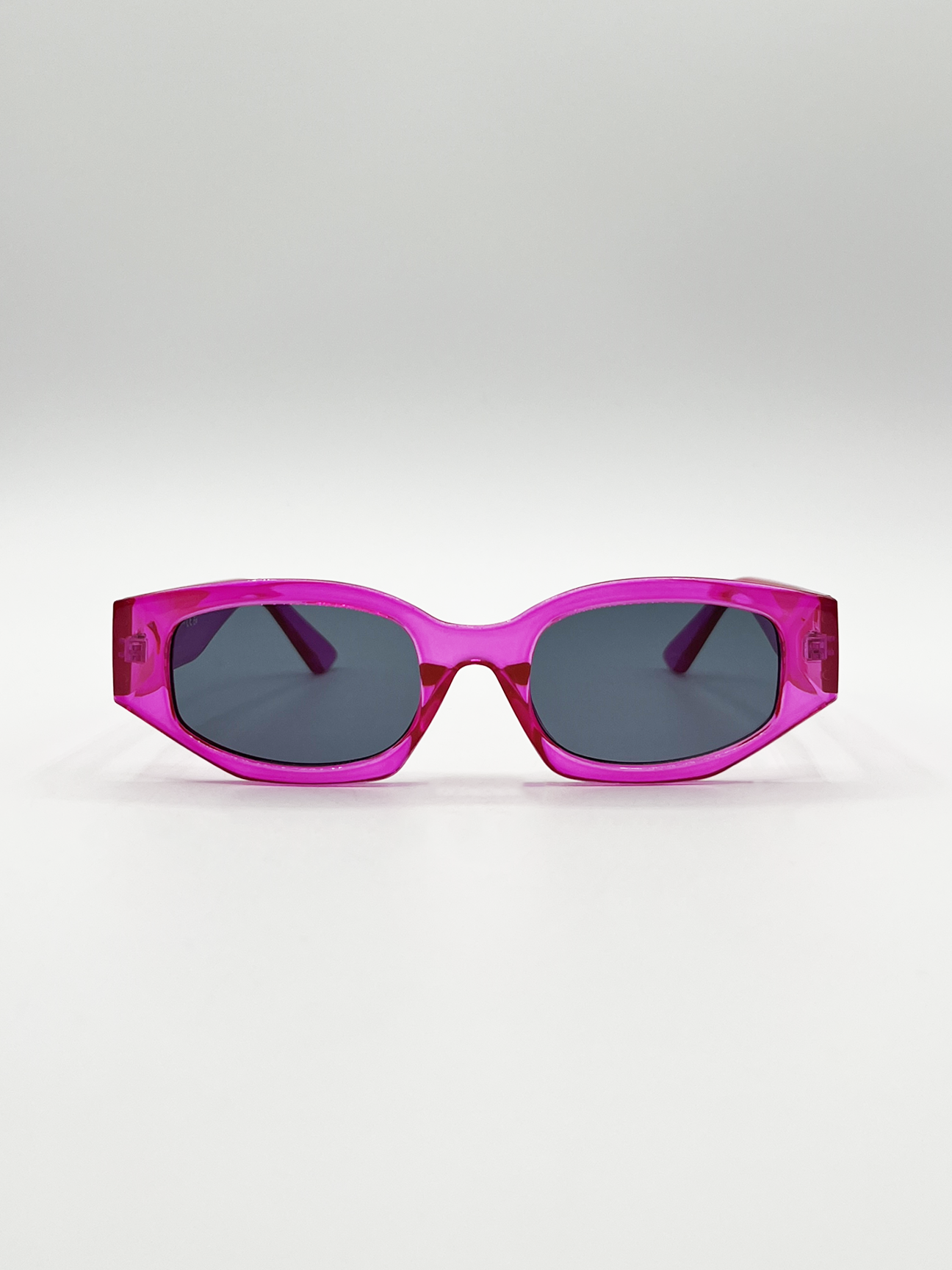 Angular Sunglasses in Translucent Hot Pink