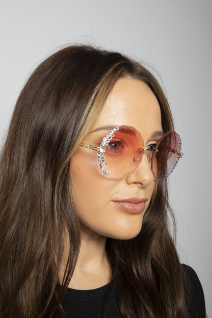 Oversized Round Frameless Sunglasses with Crystal Detail in Pink