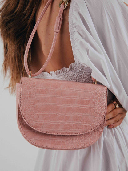 SVNX Micah Oval Shoulder Bag with Chain Detailing in Pale Pink