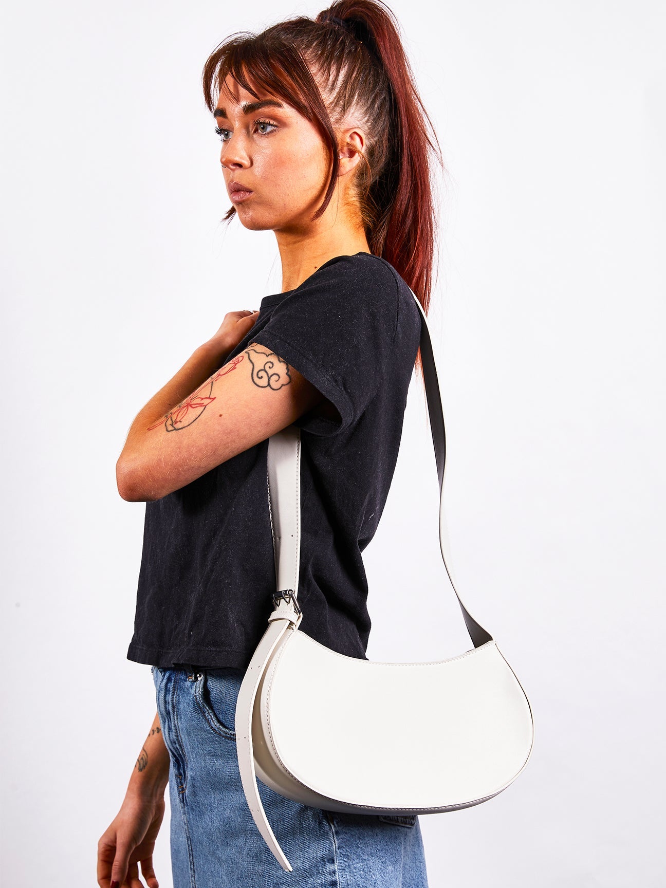 SVNX PU Leather Saddle Bag with adjustable strap in unbleached