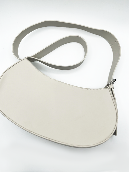 SVNX PU Leather Saddle Bag with adjustable strap in unbleached