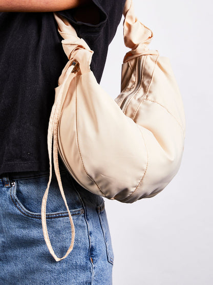 SVNX Soft Oversized Scrunchie Strap bag in unbleached cotton