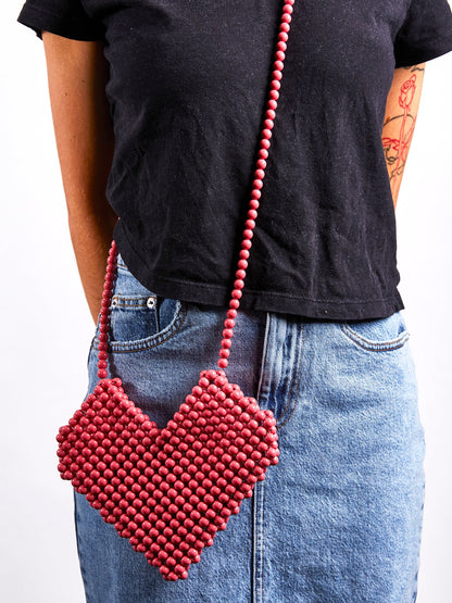 SVNX Beaded loveheart beaded cross body bag in vintage pink