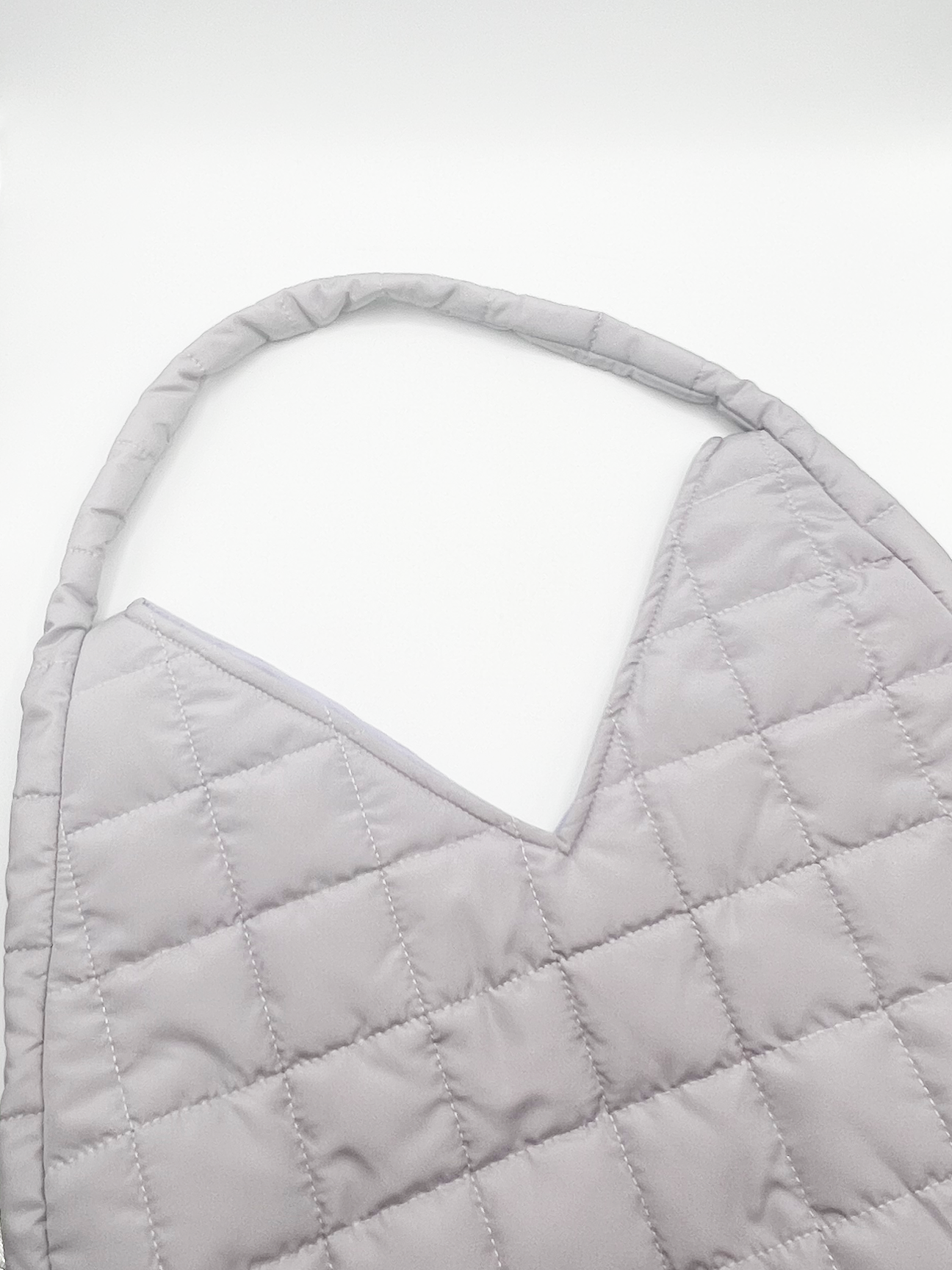 Soft quilted shoulder bag in pearl grey