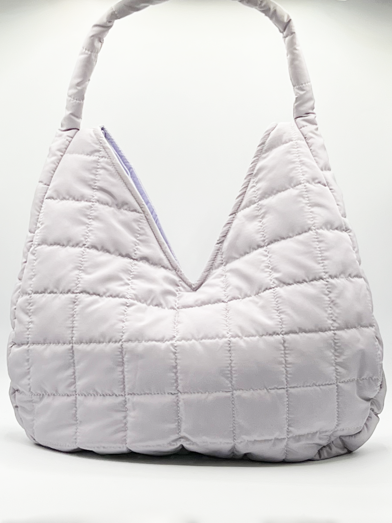 Soft quilted shoulder bag in pearl grey