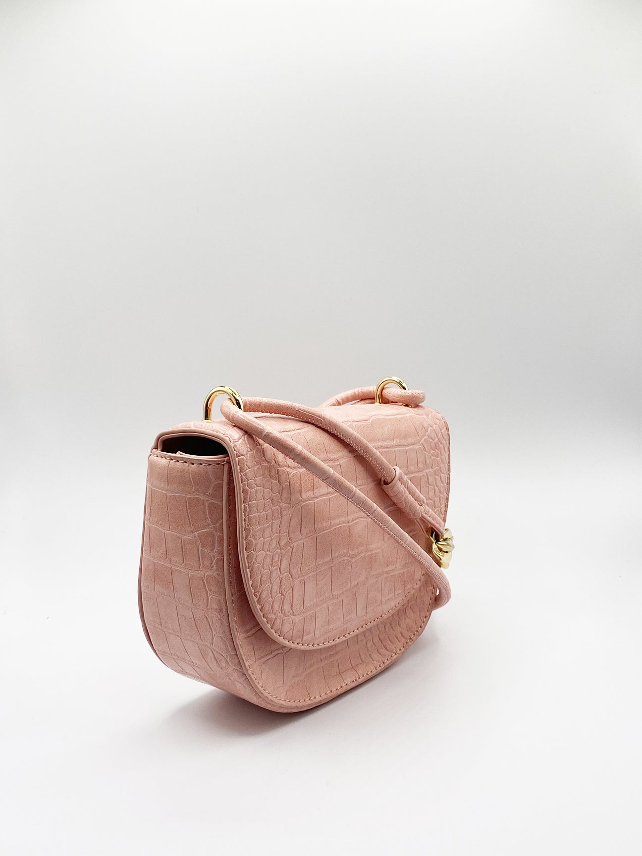 SVNX Micah Oval Shoulder Bag with Chain Detailing in Pale Pink