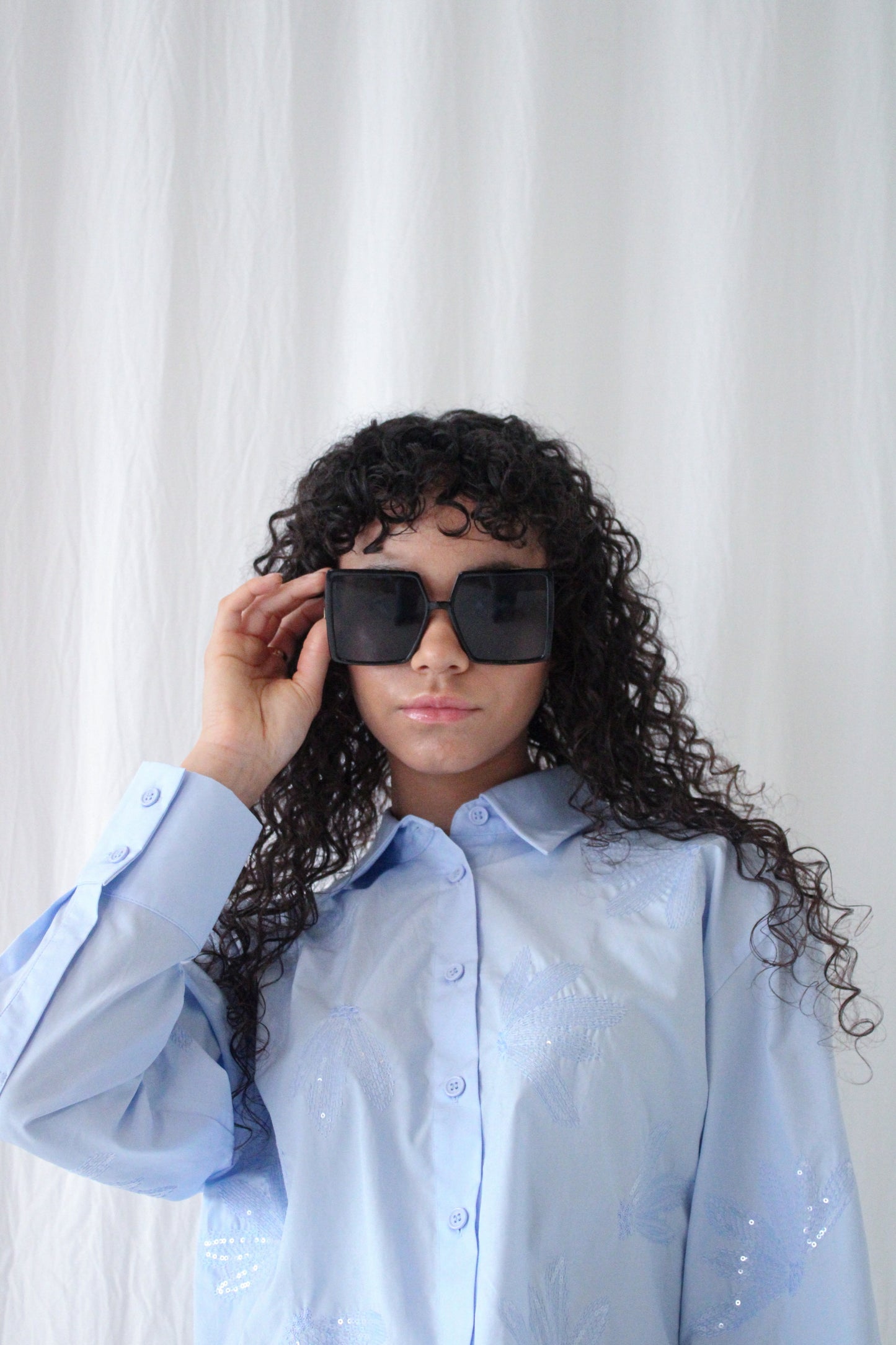 Oversized square sunglasses with temple frame detail