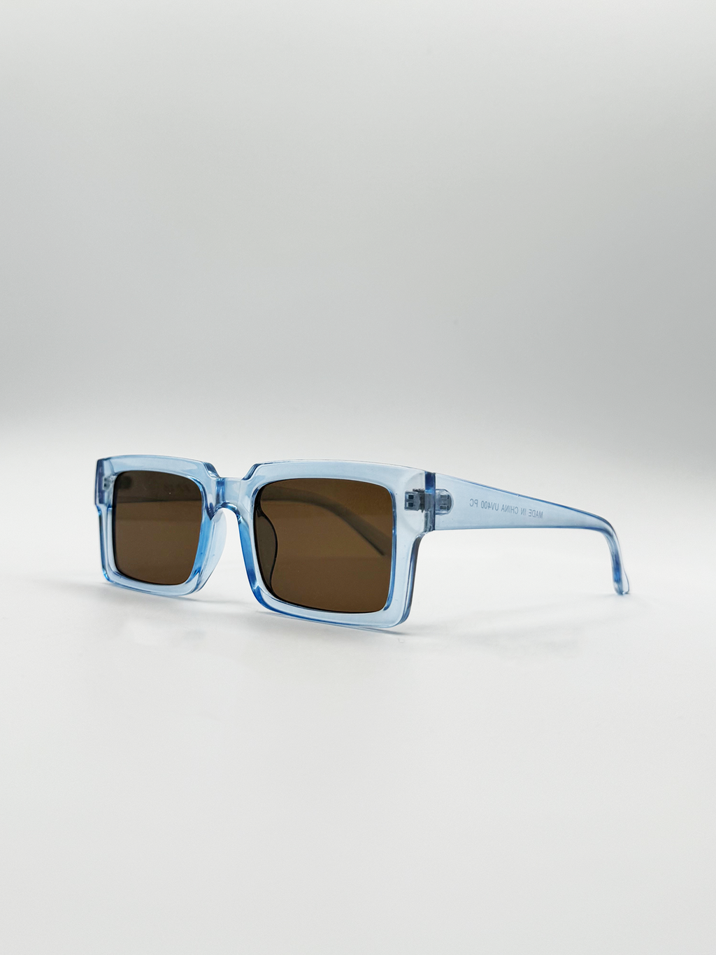 Square Frame Sunglasses in Translucent Blue with Brown Lenses