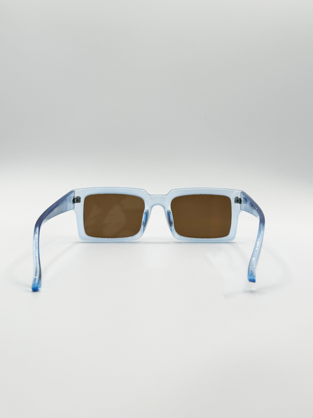 Square Frame Sunglasses in Translucent Blue with Brown Lenses