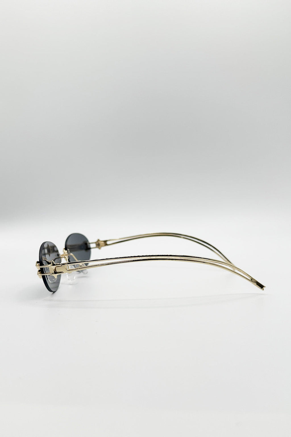 Rimless Oval Sunglasses In Black