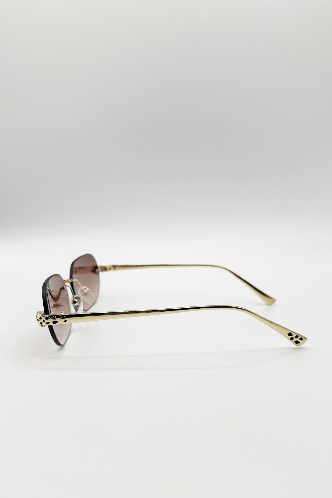 Jaguar Detail Rimless Sunglasses In Brown