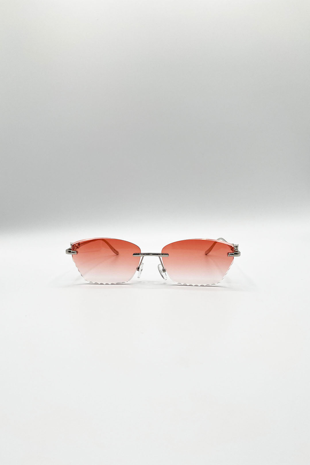 Cat Eye Rimless Sunglasses In Orange