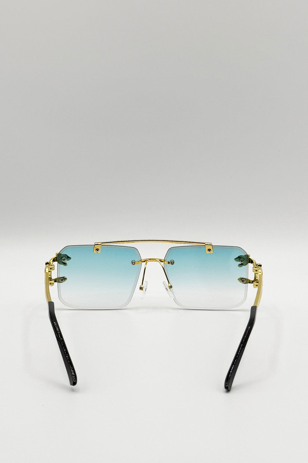 Rimeless Navigator With Side Detail Sunglasses In Blue