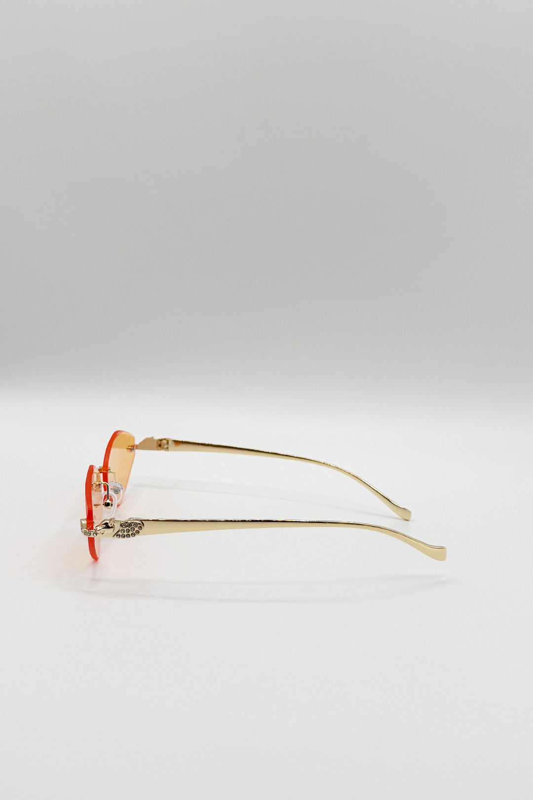 Rimless Oval Geo Metal Sunglasses in Orange