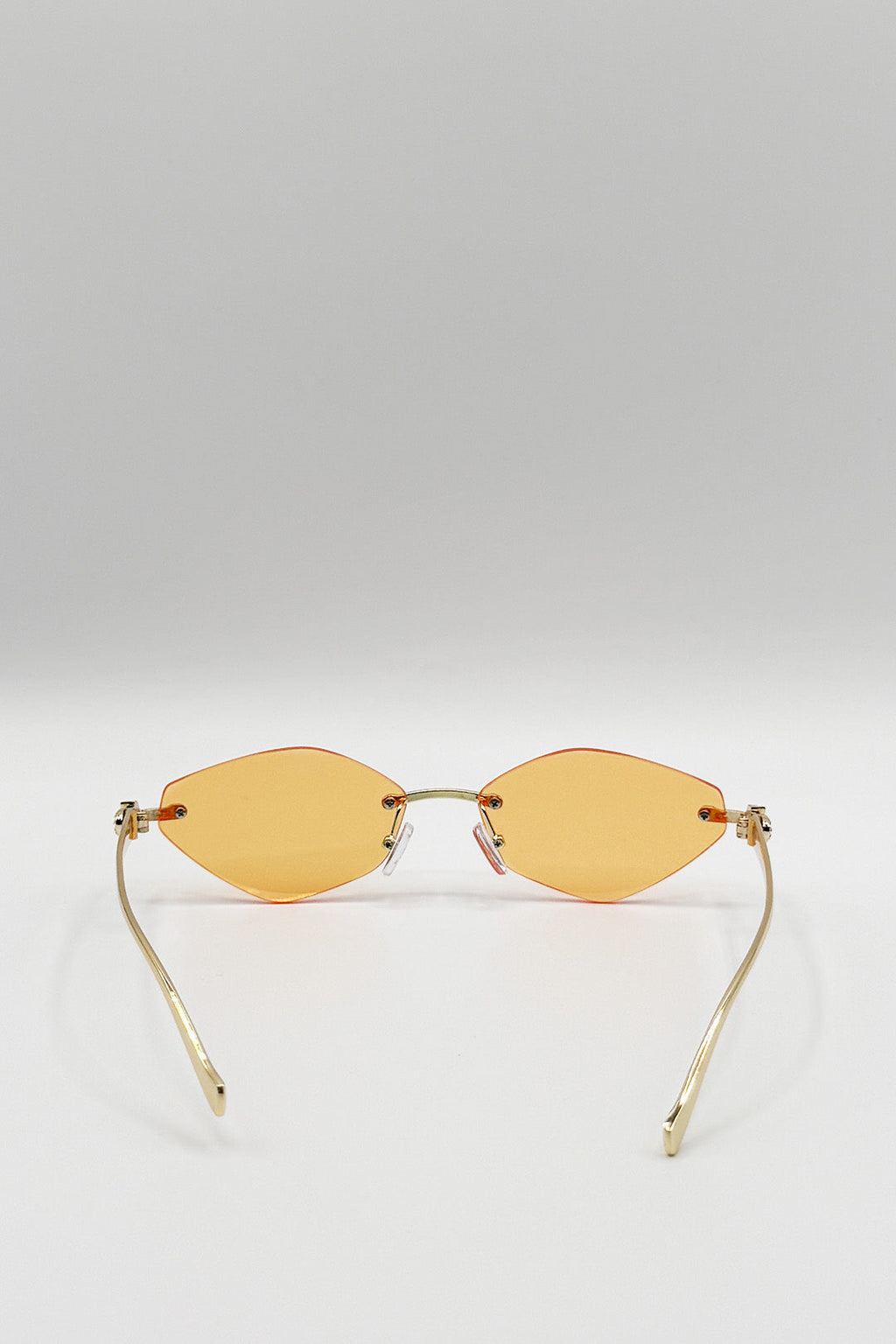 Rimless Oval Geo Metal Sunglasses in Orange