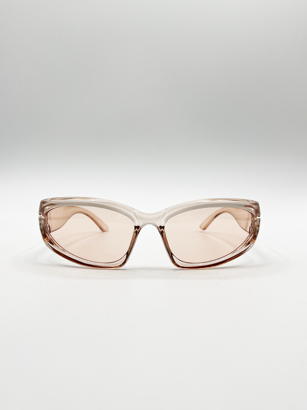 Wrap Around Racer Sunglasses in Translucent Pink