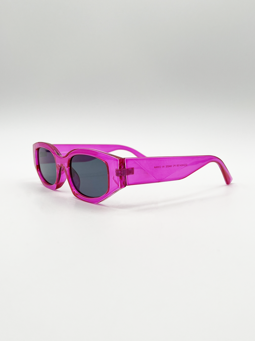 Angular Sunglasses in Translucent Hot Pink