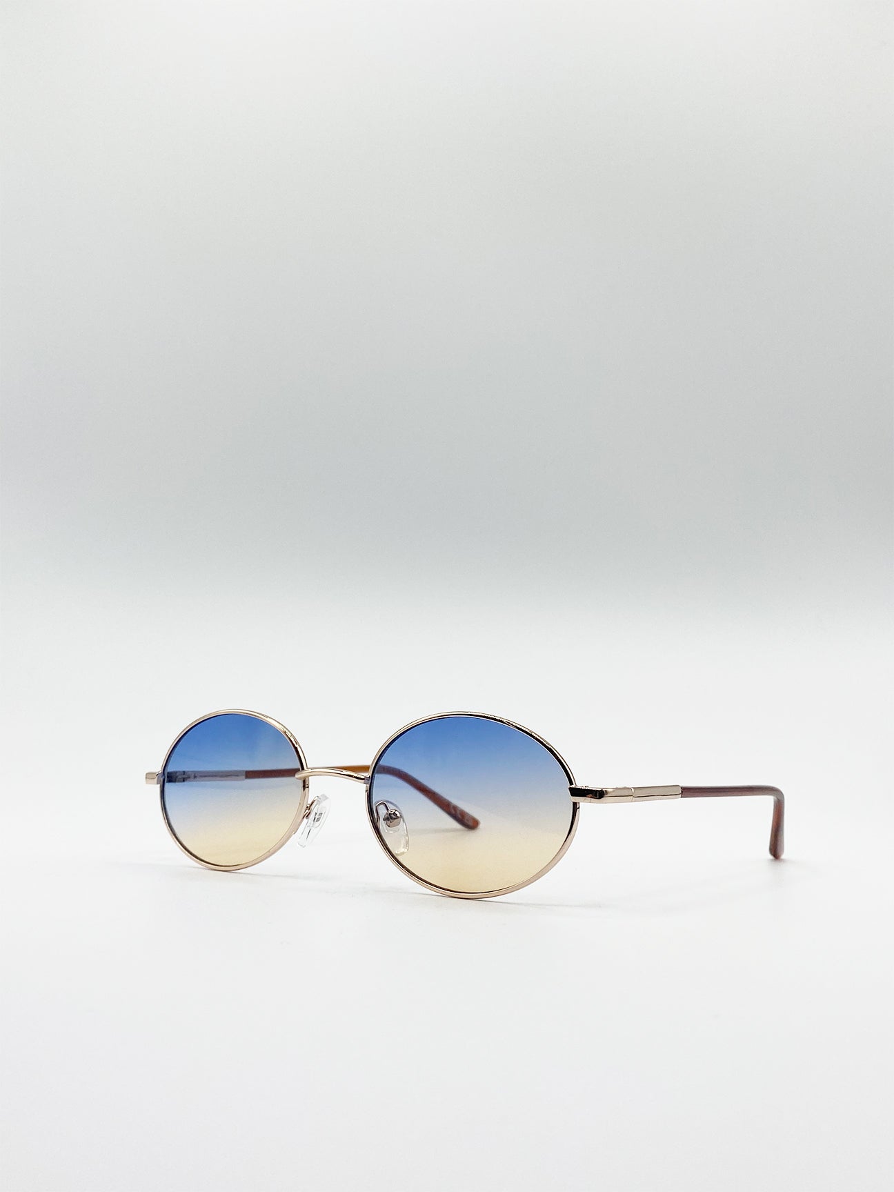 Oval Sunglasses In Ocean Lens